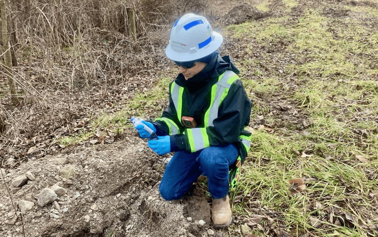 worker doing environmental sampling